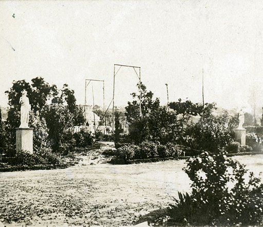 Grayscale image showing Cremorne Gardens with statues